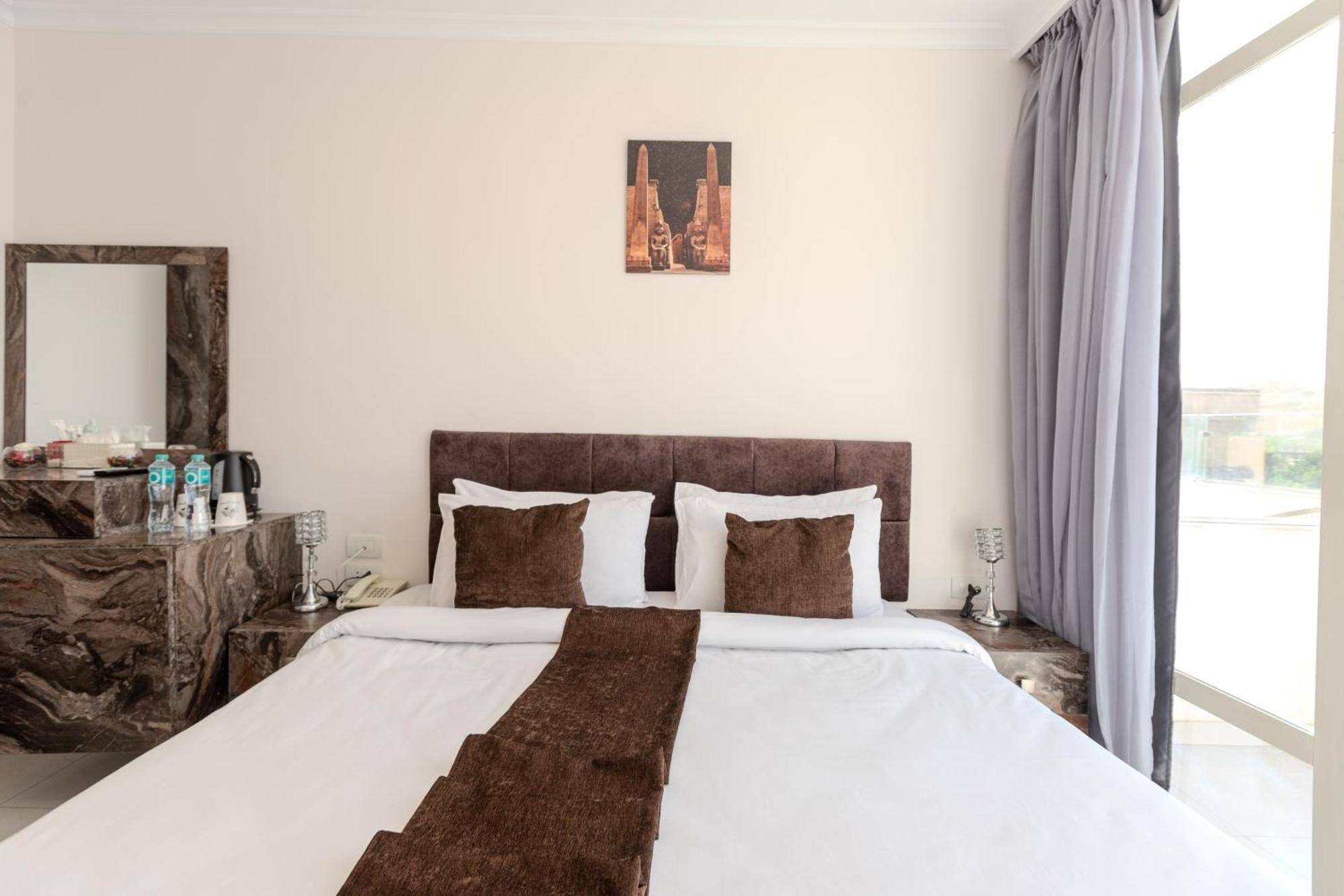 Shadow Pyramids Suites And Jacuzzi Kafret el-Gabal المظهر الخارجي الصورة